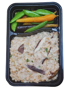 Creamy truffle mushroom farro risotto with seasonal vegetables.